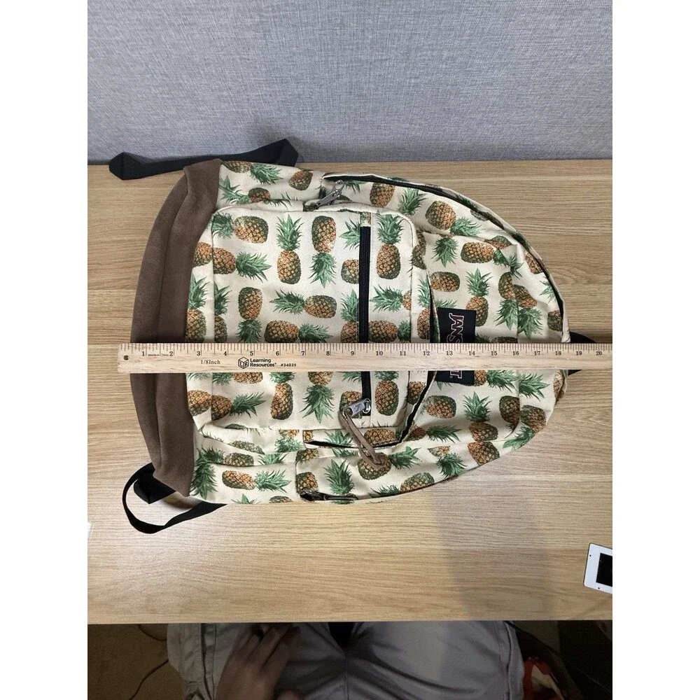 JanSport Right Pack Expressions Backpack Pineapple Print Suede Bottom Laptop Bag